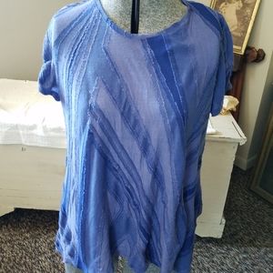 Flowy short sleeve blouse.